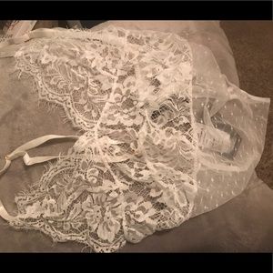 White one piece “Celebrity” teddy NWT